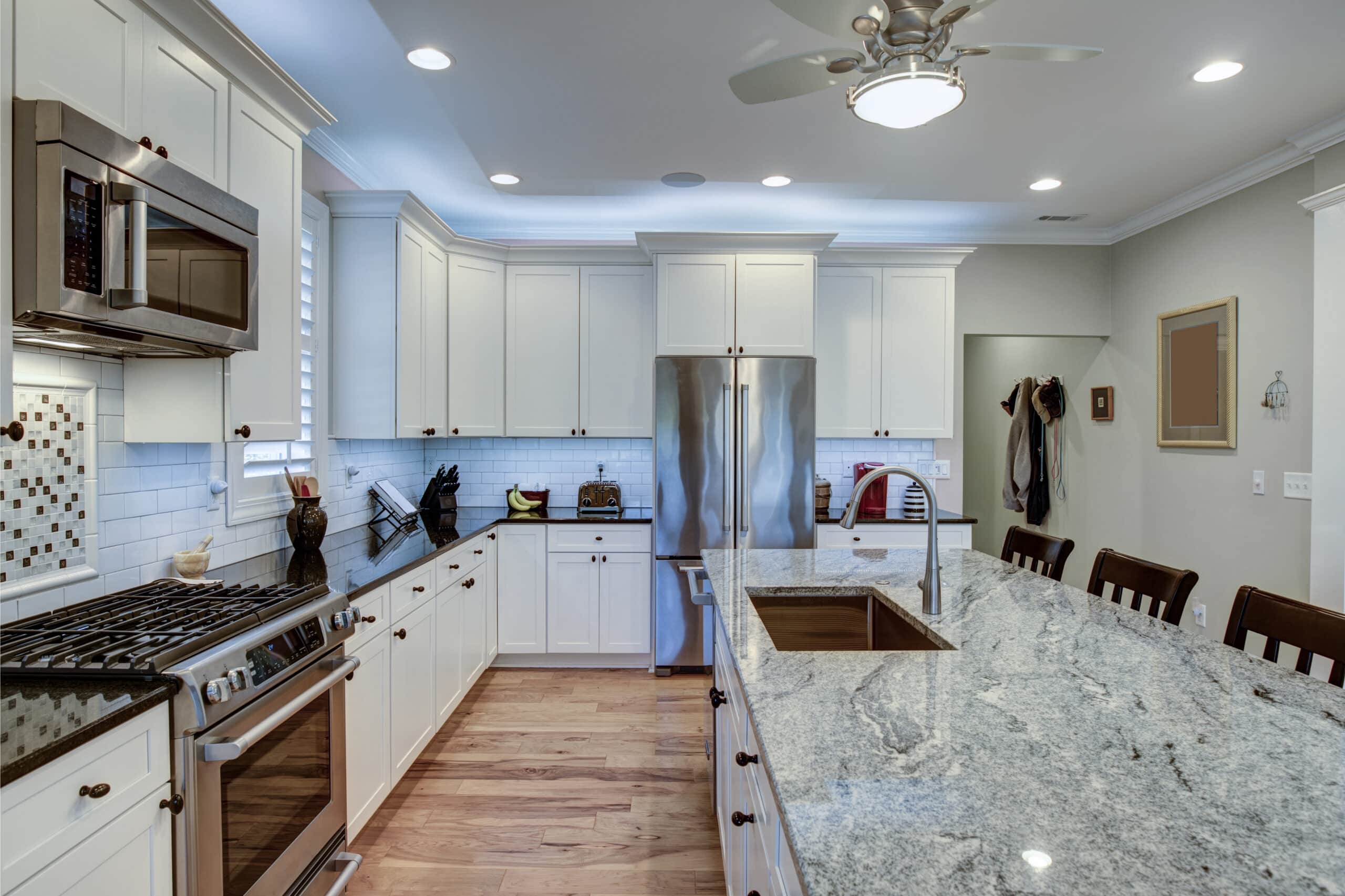 Luxury kitchen remodeling with quartz countertops and white cabinets in Glen Mills PA
